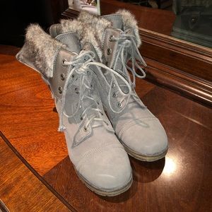 Gray colored faux fur boots